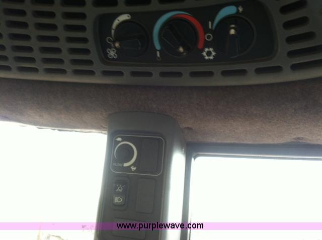 image for item A1718 1998 New Holland TV140 bi-directional 4WD tractor