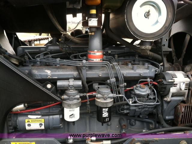 image for item A1718 1998 New Holland TV140 bi-directional 4WD tractor