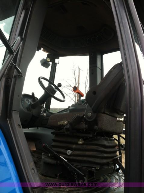 image for item A1718 1998 New Holland TV140 bi-directional 4WD tractor