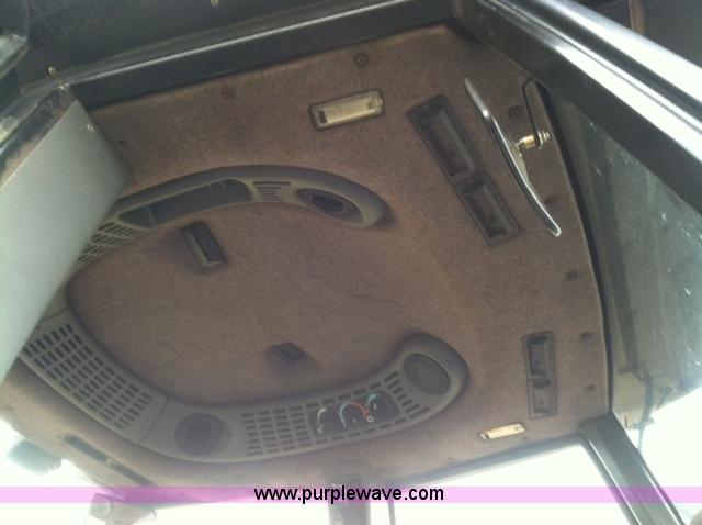 image for item A1718 1998 New Holland TV140 bi-directional 4WD tractor