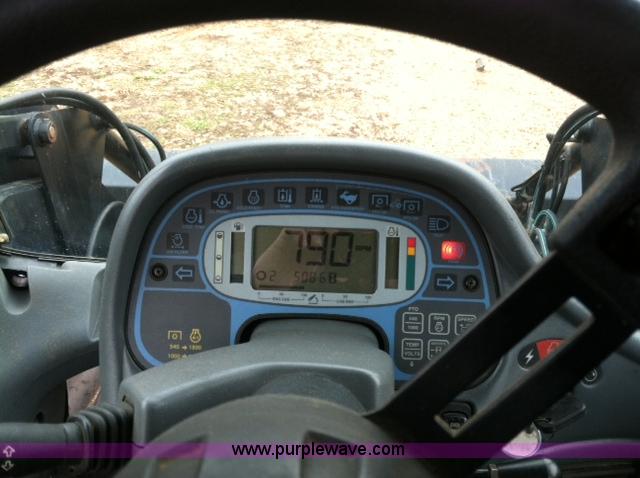 image for item A1718 1998 New Holland TV140 bi-directional 4WD tractor