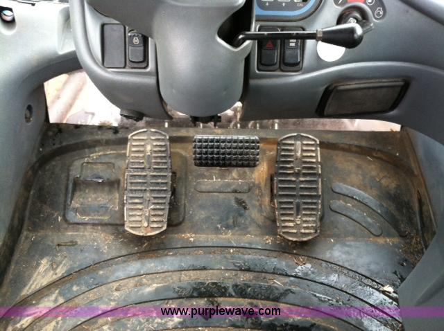 image for item A1718 1998 New Holland TV140 bi-directional 4WD tractor