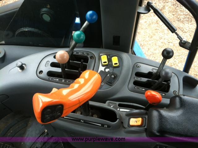 image for item A1718 1998 New Holland TV140 bi-directional 4WD tractor