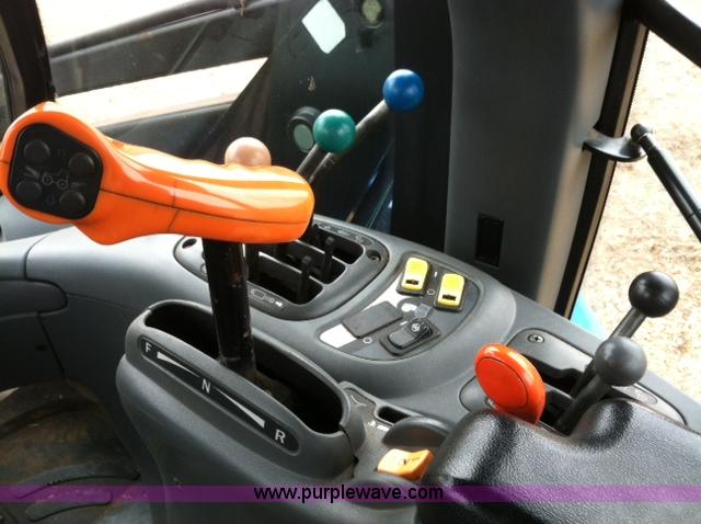 image for item A1718 1998 New Holland TV140 bi-directional 4WD tractor