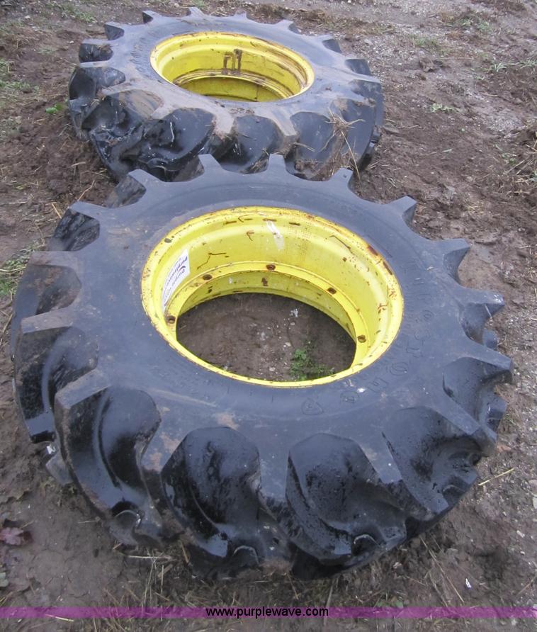 image for item A5680 (2) Firestone 14.9-24 tires with wheels