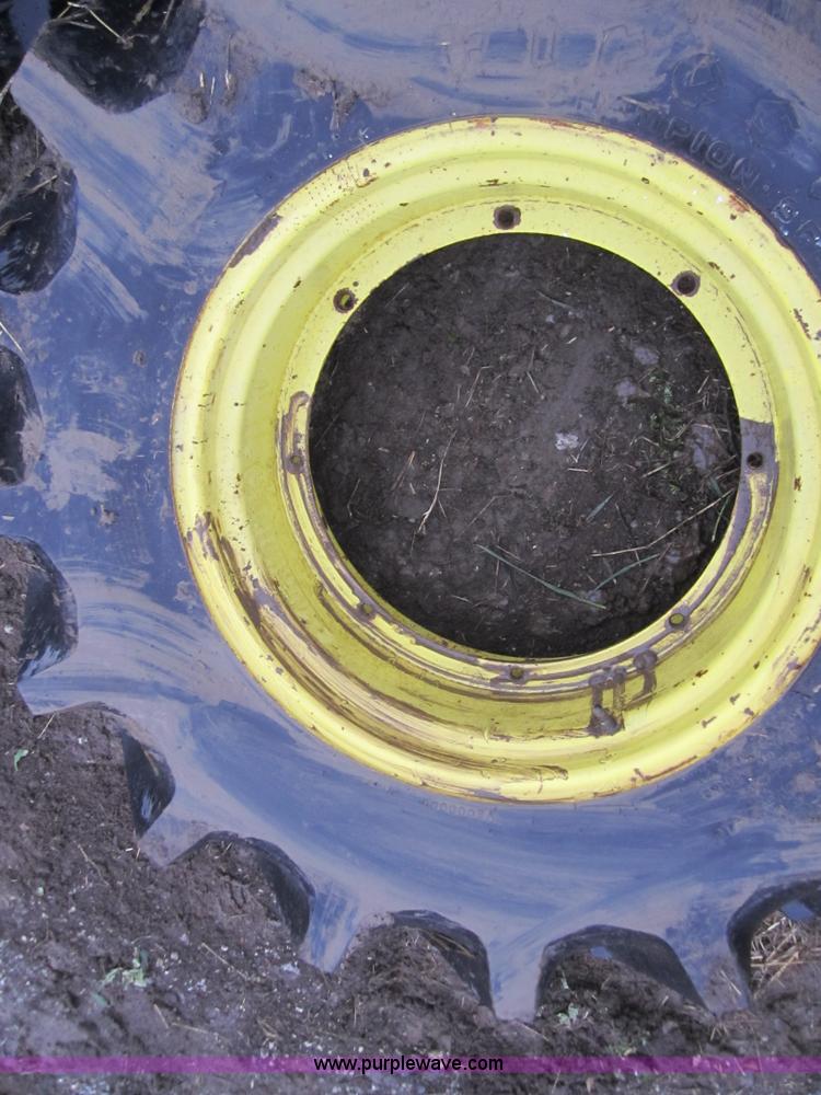 image for item A5680 (2) Firestone 14.9-24 tires with wheels