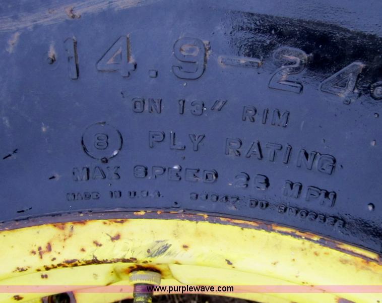 image for item A5680 (2) Firestone 14.9-24 tires with wheels