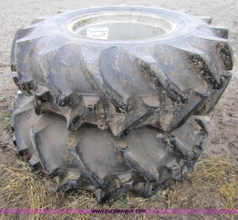 image for item A5681 (2) Goodyear 18.4-26 tires with wheels