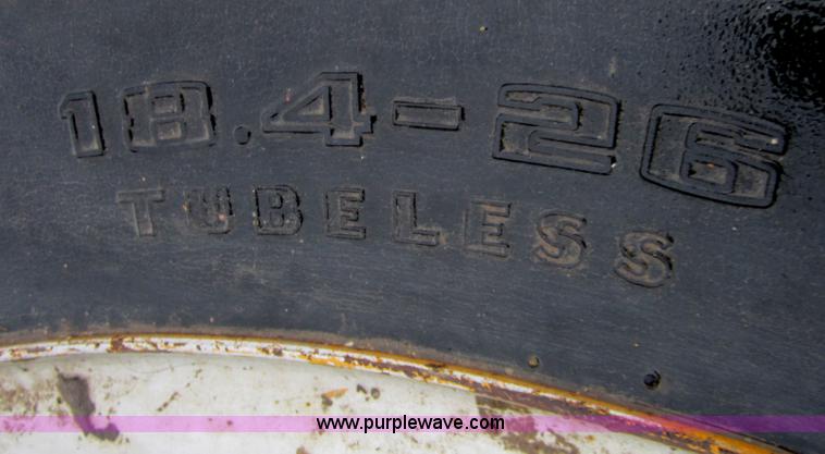 image for item A5681 (2) Goodyear 18.4-26 tires with wheels