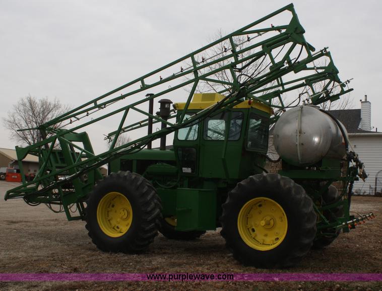 image for item A6560 John Deere 7520 shop built sprayer