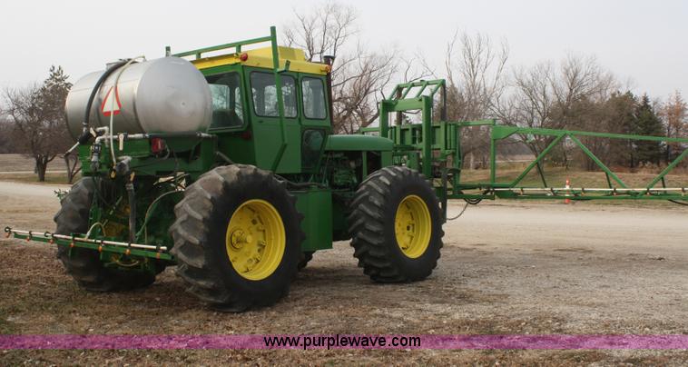 image for item A6560 John Deere 7520 shop built sprayer