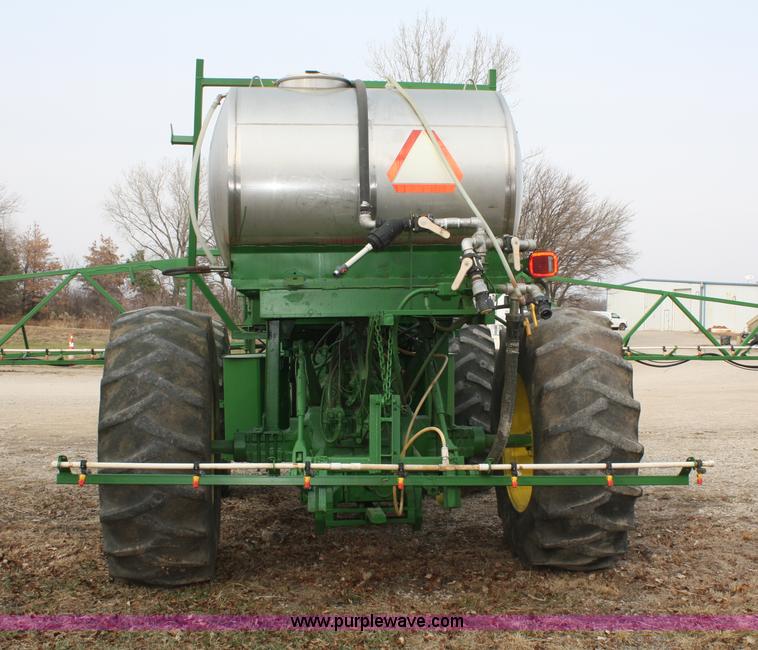 image for item A6560 John Deere 7520 shop built sprayer