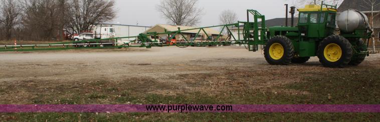 image for item A6560 John Deere 7520 shop built sprayer