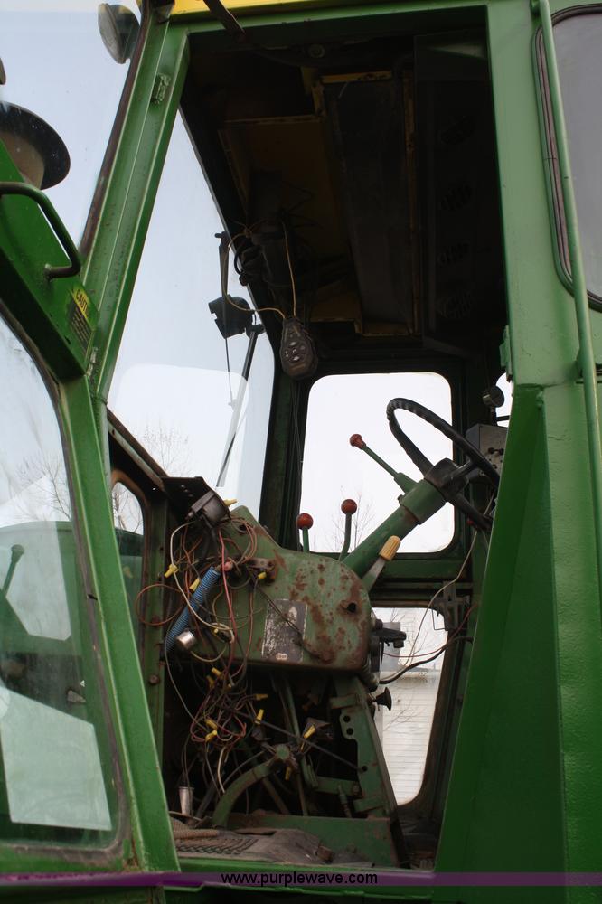 image for item A6560 John Deere 7520 shop built sprayer