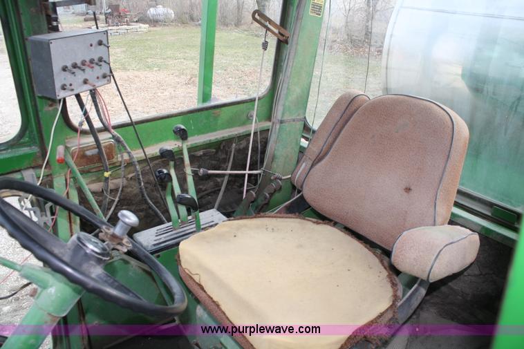 image for item A6560 John Deere 7520 shop built sprayer