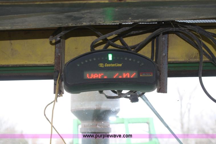 image for item A6560 John Deere 7520 shop built sprayer