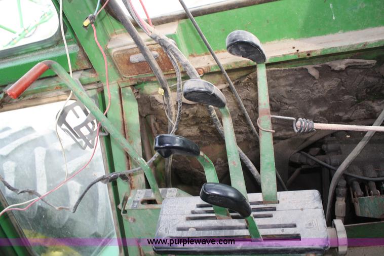 image for item A6560 John Deere 7520 shop built sprayer