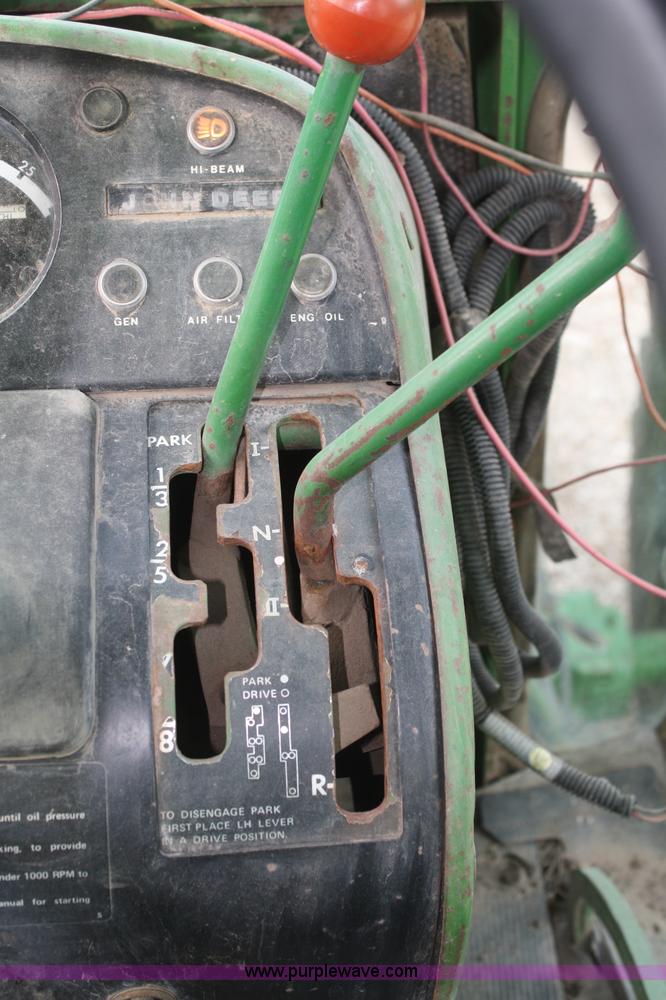 image for item A6560 John Deere 7520 shop built sprayer