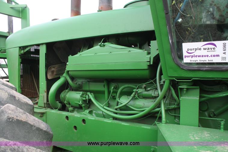 image for item A6560 John Deere 7520 shop built sprayer