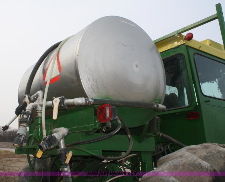 image for item A6560 John Deere 7520 shop built sprayer