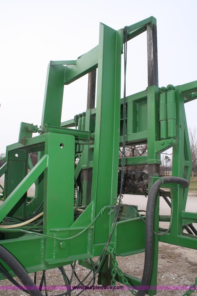 image for item A6560 John Deere 7520 shop built sprayer