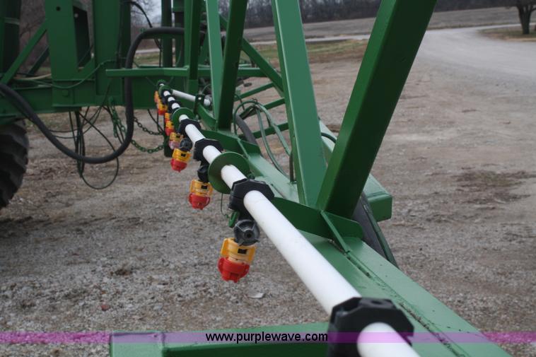 image for item A6560 John Deere 7520 shop built sprayer