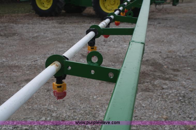 image for item A6560 John Deere 7520 shop built sprayer