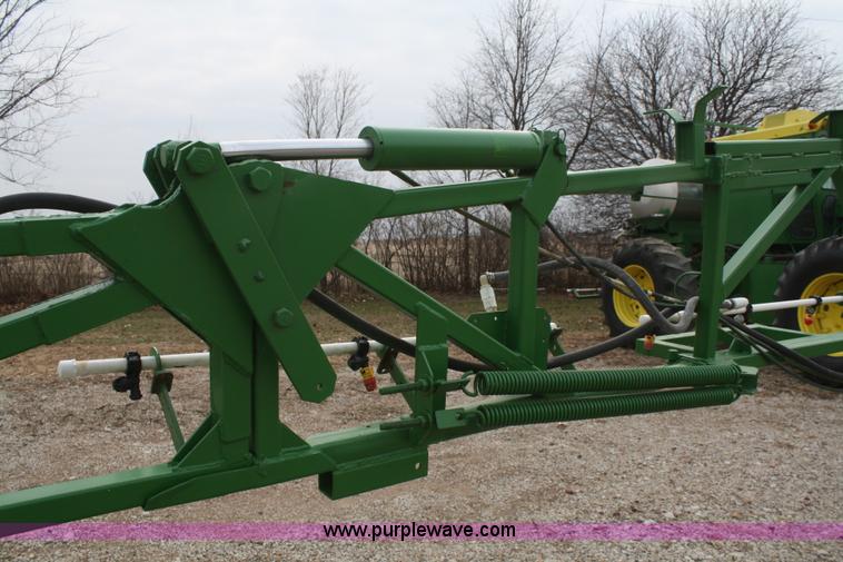 image for item A6560 John Deere 7520 shop built sprayer
