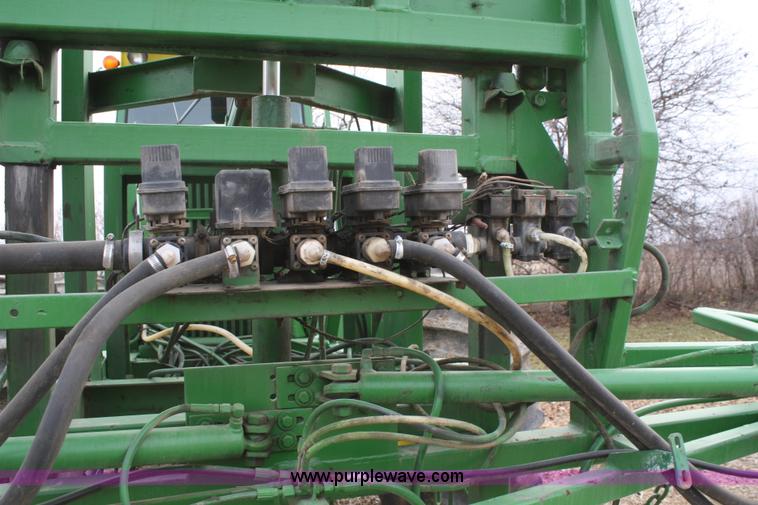image for item A6560 John Deere 7520 shop built sprayer