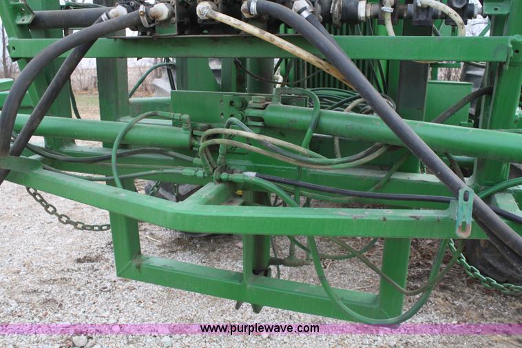 image for item A6560 John Deere 7520 shop built sprayer
