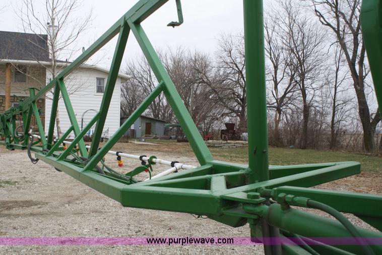 image for item A6560 John Deere 7520 shop built sprayer