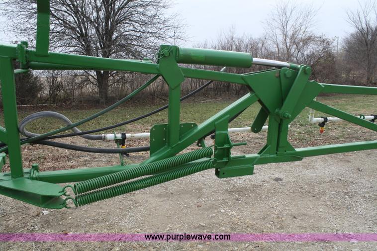 image for item A6560 John Deere 7520 shop built sprayer