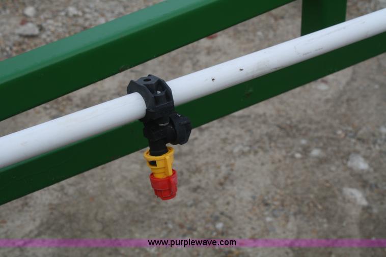 image for item A6560 John Deere 7520 shop built sprayer