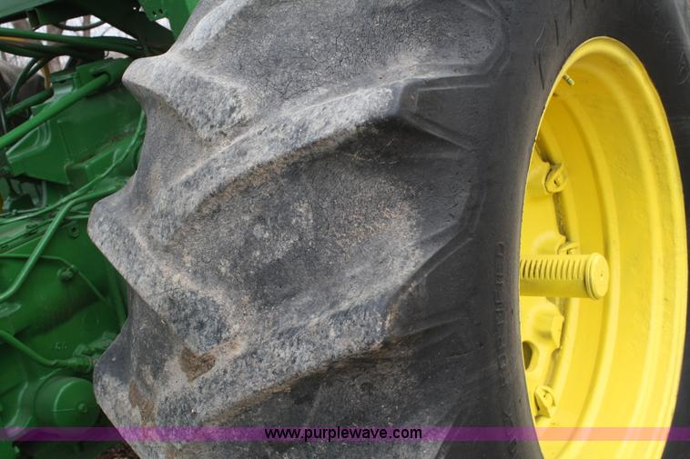 image for item A6560 John Deere 7520 shop built sprayer