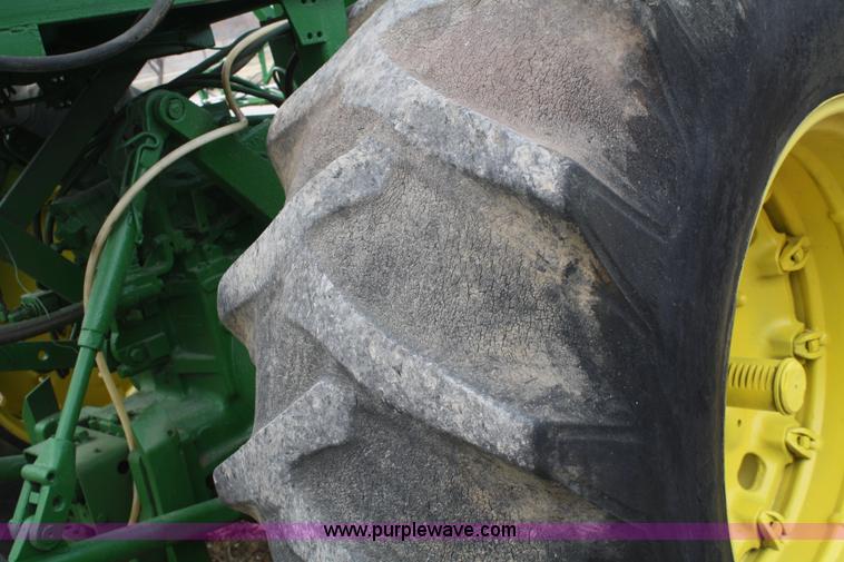 image for item A6560 John Deere 7520 shop built sprayer