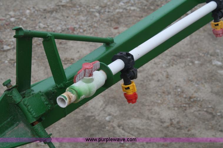 image for item A6560 John Deere 7520 shop built sprayer