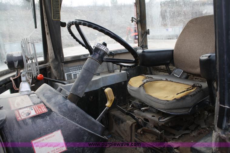 image for item A6583 1980 John Deere 8640 4WD tractor with blade