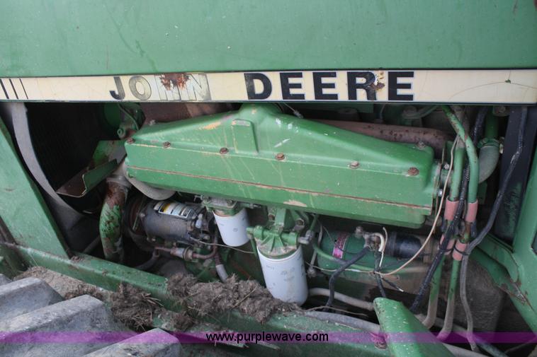 image for item A6583 1980 John Deere 8640 4WD tractor with blade