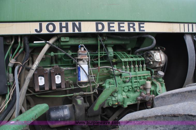 image for item A6583 1980 John Deere 8640 4WD tractor with blade