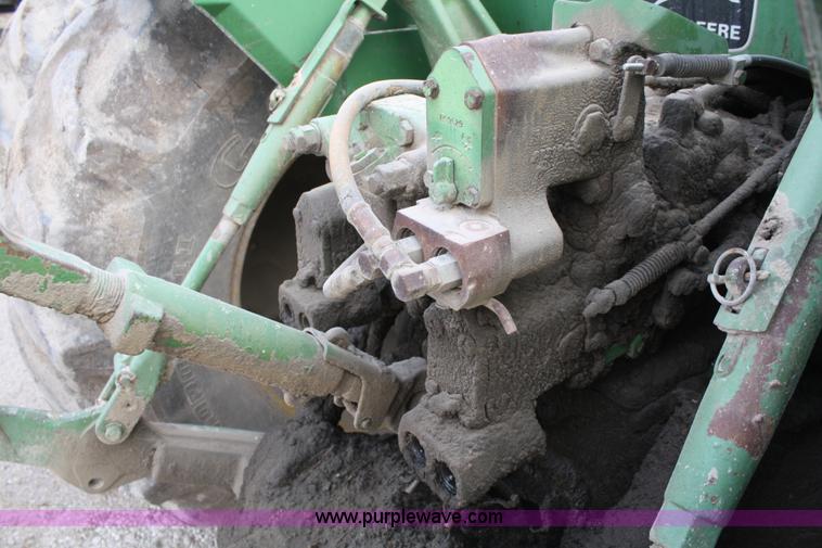 image for item A6583 1980 John Deere 8640 4WD tractor with blade