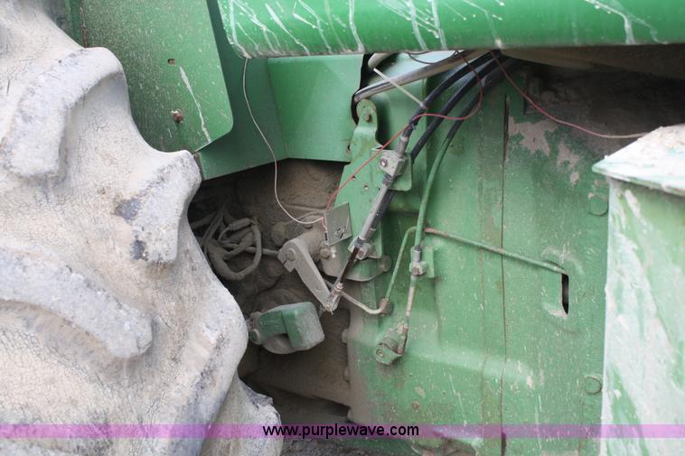 image for item A6583 1980 John Deere 8640 4WD tractor with blade