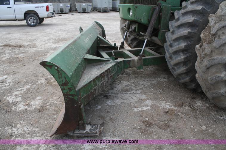image for item A6583 1980 John Deere 8640 4WD tractor with blade