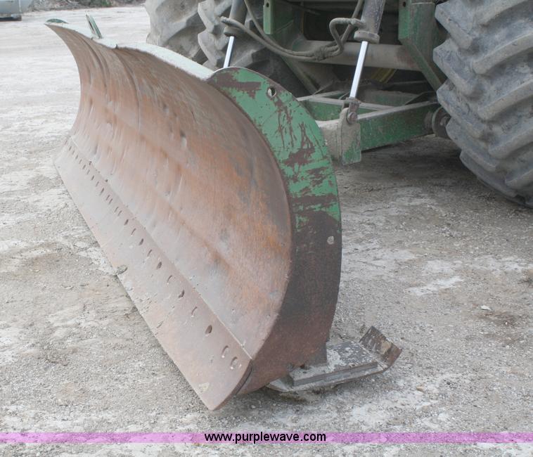 image for item A6583 1980 John Deere 8640 4WD tractor with blade