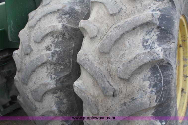 image for item A6583 1980 John Deere 8640 4WD tractor with blade