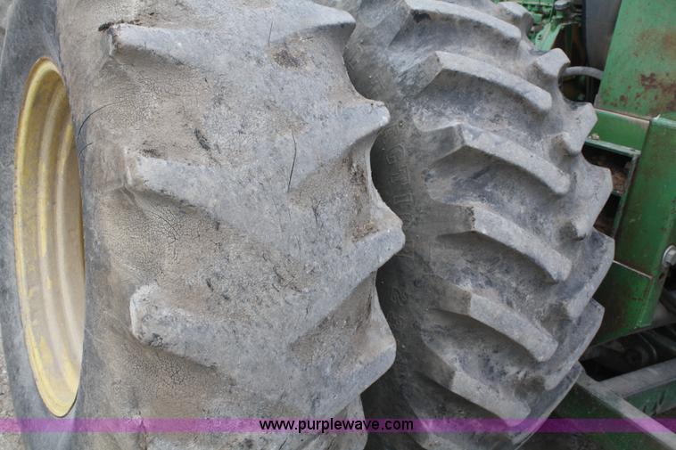 image for item A6583 1980 John Deere 8640 4WD tractor with blade