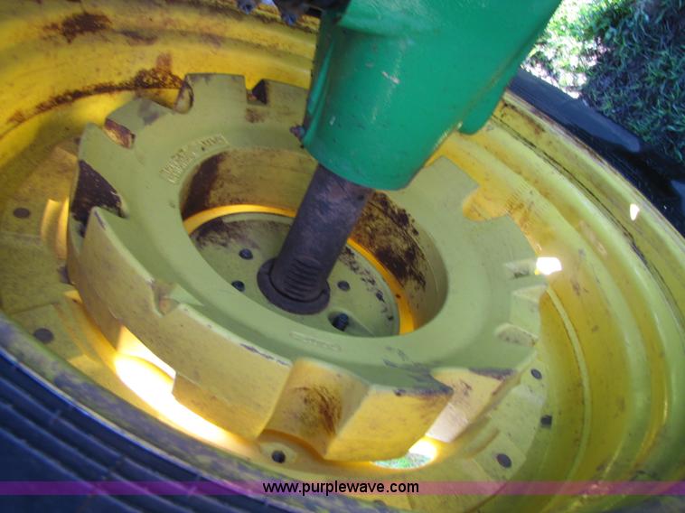 image for item B2139 2009 John Deere 7330 Premium MFWD tractor