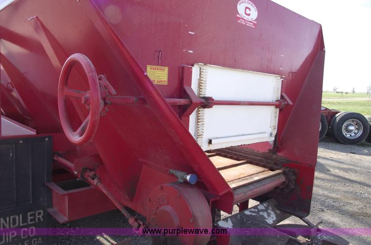 image for item C5897 2006 Chandler 26' triple axle spreader
