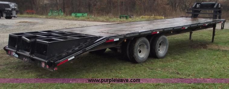 image for item C5947 2005 Longhorn 32' flatbed gooseneck trailer