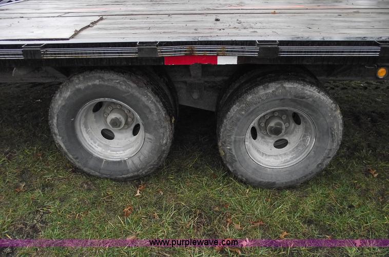 image for item C5947 2005 Longhorn 32' flatbed gooseneck trailer