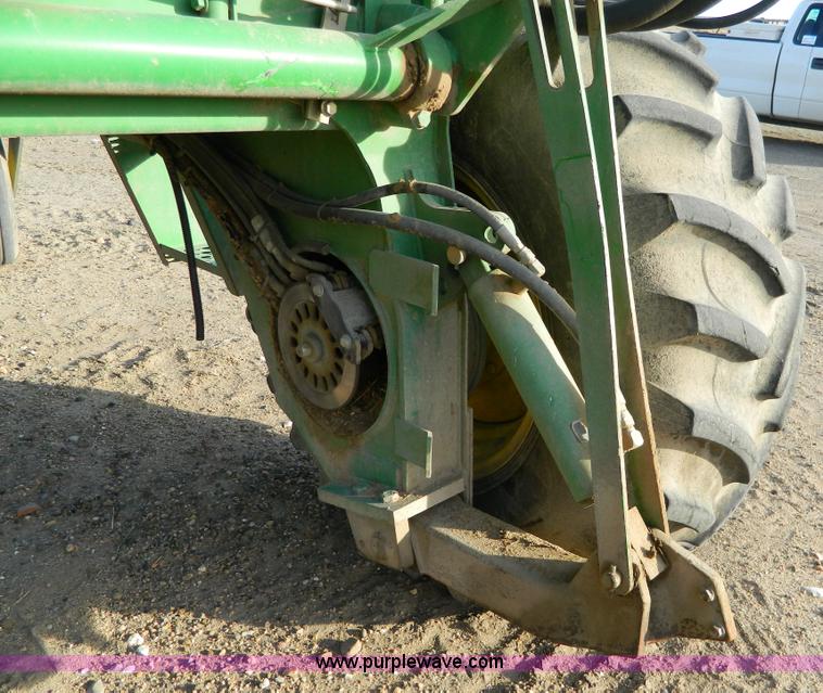 image for item D8640 2004 John Deere 4995 swather